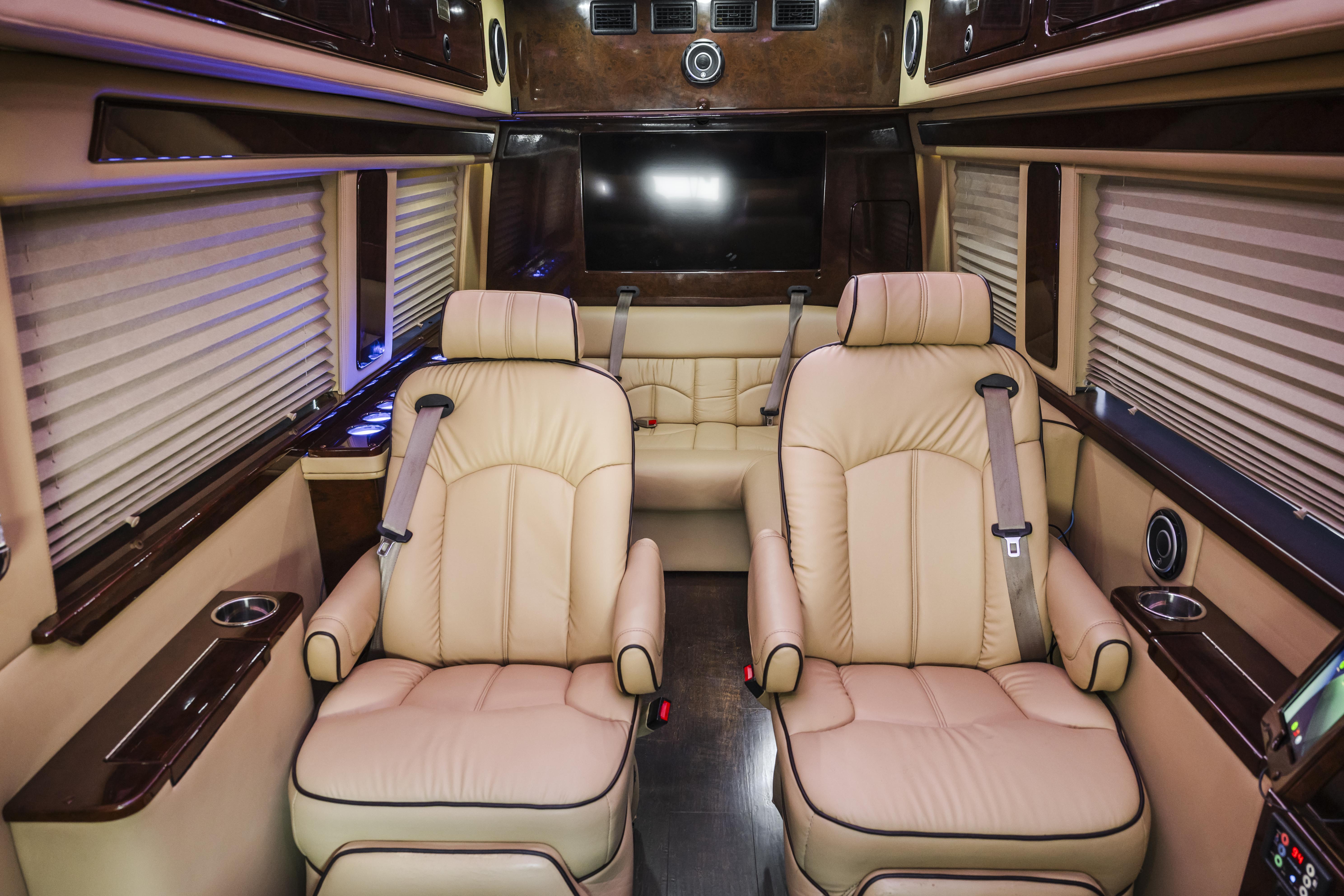 J-Lounge cabin with cream seating and wood trim